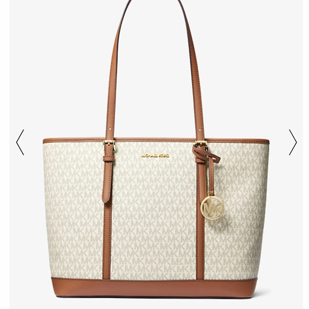 MICHAEL KORS
Jet Set Travel Large Logo Tote Shoulder Bag
COLOR VANILLA 
NWT - Picture 4 of 16